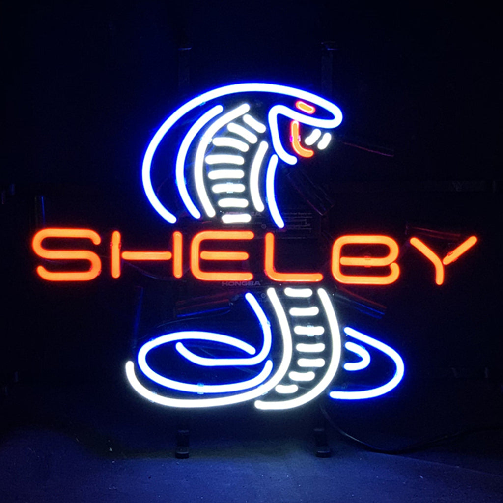 Neon light sign featuring SHELBY text and blue cobra graphic with red-orange accents