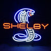 Neon light sign featuring SHELBY text and blue cobra graphic with red-orange accents