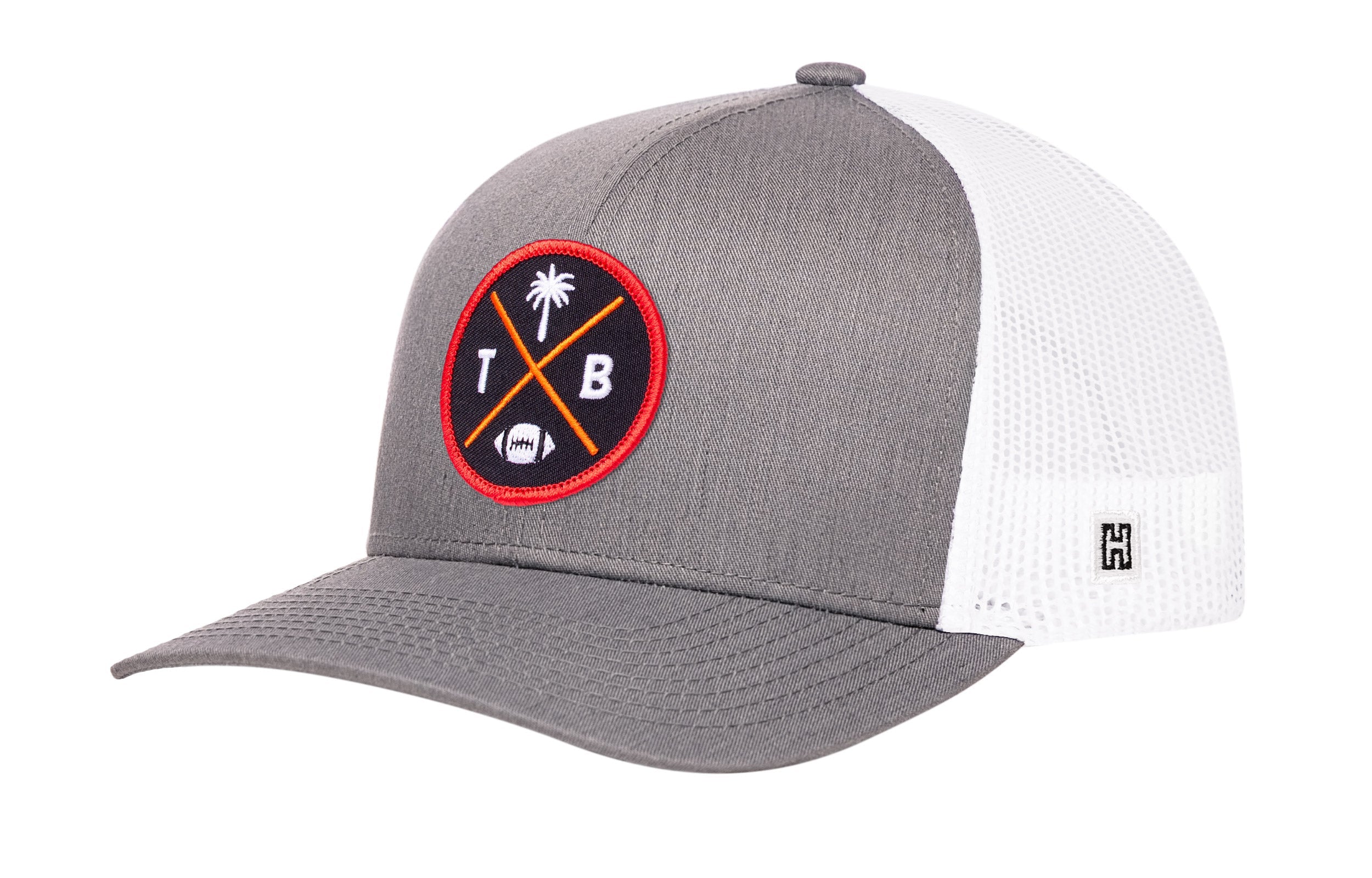 Gray trucker hat with red logo patch, curved brim, and white mesh back panels