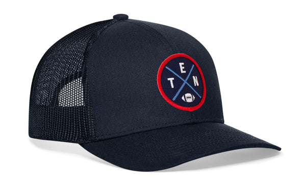 Black trucker cap with mesh side panels, round logo patch, and small H emblem