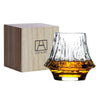 Japanese crystal whisky glass with amber liquid next to EDO Glass box