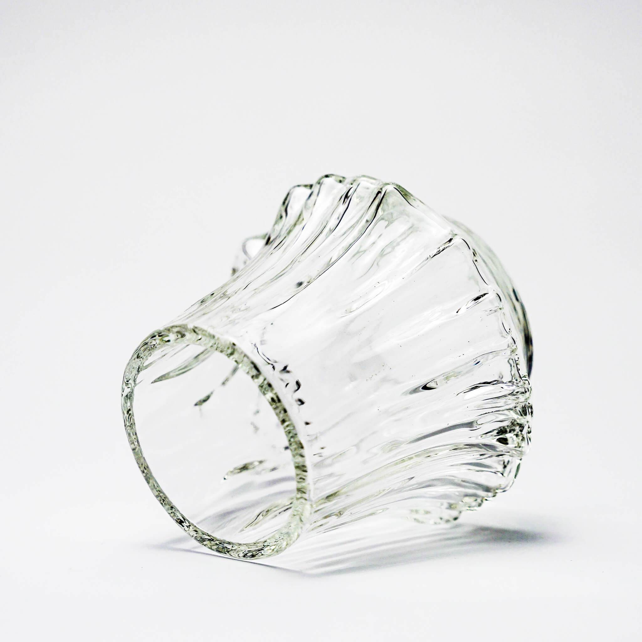Clear fluted crystal whisky tumbler, close-up side and thick rim