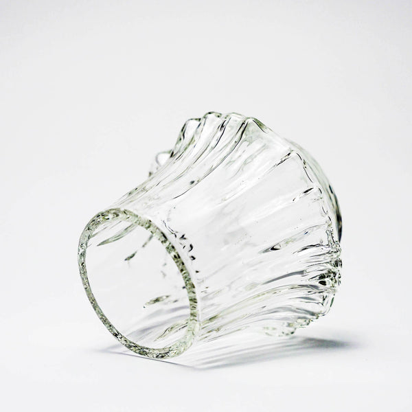 Clear fluted crystal whisky tumbler, close-up side and thick rim