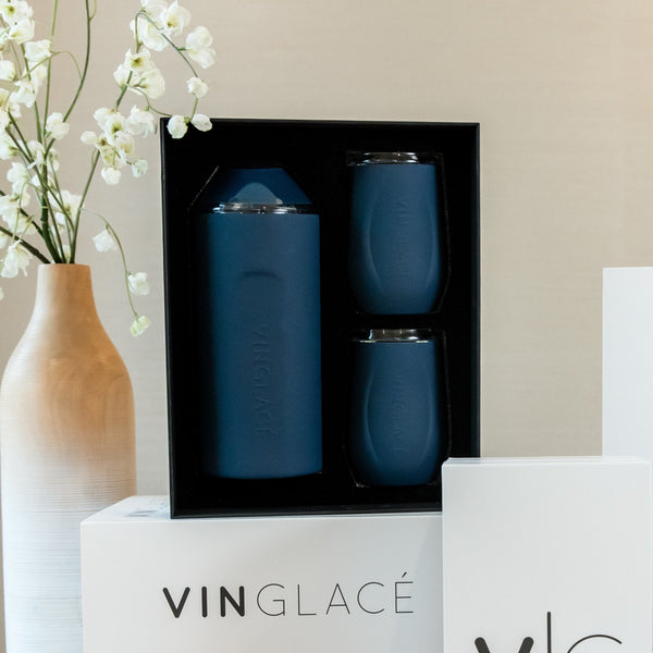Blue wine bottle cooler set with two matching tumblers in a gift box